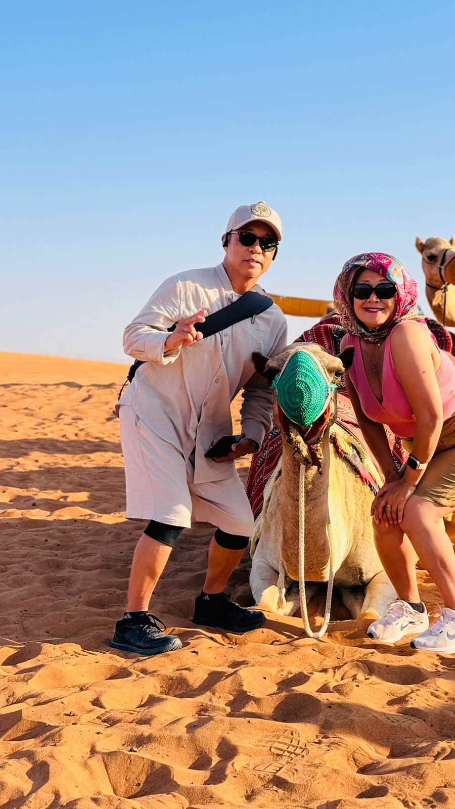 Family on a desert camel ride