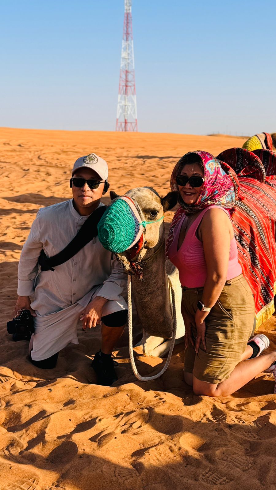 Guests meeting a camel in Dubai