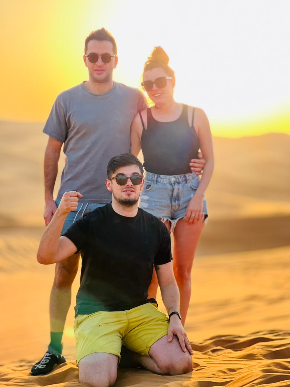 Friends at sunset in the dunes