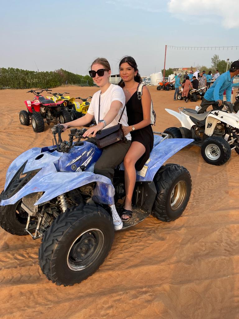 Guests riding quad bikes in the dunes